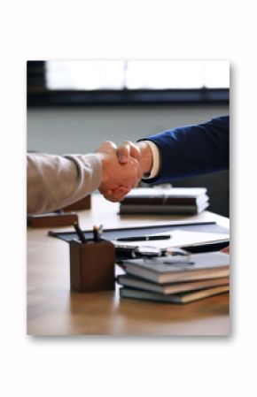 Male lawyer working with clients in office, closeup