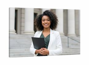Confident Professional Standing in Front of Courthouse with Legal Document