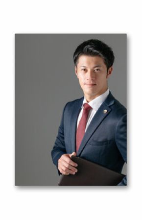 ファイルを持った男性弁護士