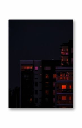 A lunar eclipse above an apartment building