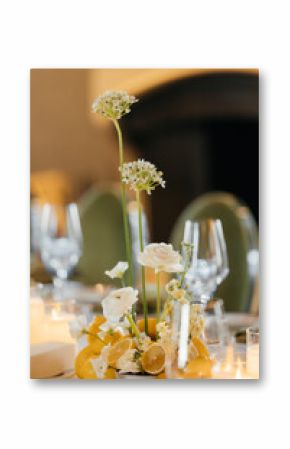 Event decor with white orchids and other white flowers in a restaurant. Restaurant design.