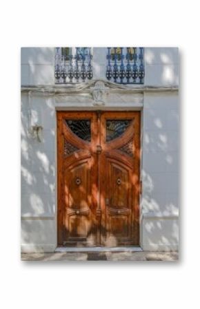 Ornate Wooden Double Doors with Ironwork Details in Valencia City, Spain. Architectural Detail, Old Town Entrance, Historic Doorway, Carved Wood, Decorative Iron, Traditional Spanish Architecture
