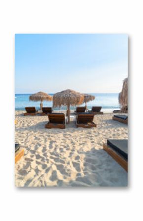 summer beach with sunbeds, Mykonos island, Greece