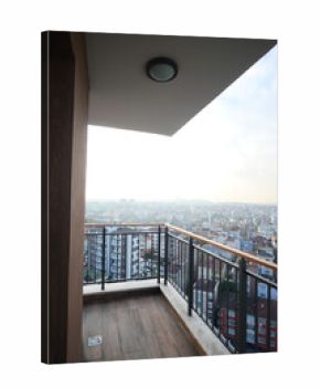 Elevated view of city from a modern balcony at sunset