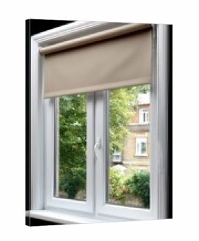 Bright view through a clean window with beige roller blind showcasing a garden outside on a sunny day in a residential area