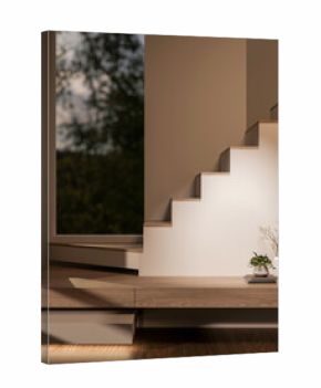 Potted plant over books and vase on wooden staircase with garden view window in a dim lit corridor.