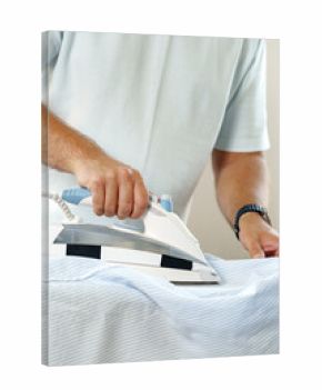 Man ironing a shirt on an ironing board in a well-lit room