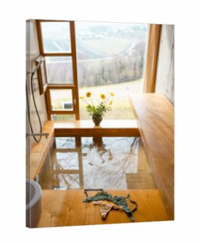 Freshly run bath with lingerie on wood evokes intimacy and relaxation. Perfect for wellness, spa, retreat, or editorial content about slow living and sensual rituals
