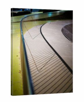 Sinuous Concrete Edge and Green Paving at Night