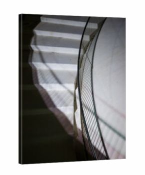 Vertical Perspective of Illuminated Curved Stairs