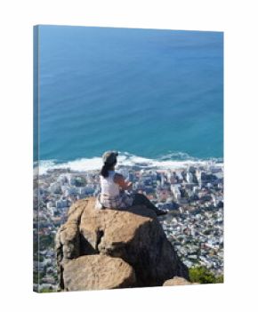 Woman Sitting on Cliff Edge Overlooking Cape Town from Lion’s Head