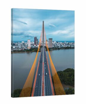 Symmetric modern cable-stayed bridge over Han River in Da Nang, Contemporary urban span connecting city skyline across Vietnamese waterway