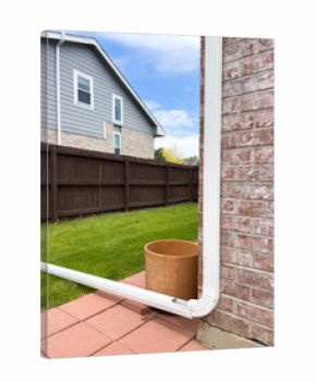 White Drain Pipe Curved Over Lawn Edge
