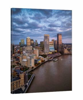 Aerial view of the financial district Canary Wharf, London, with the skyscrapers at the River Thames