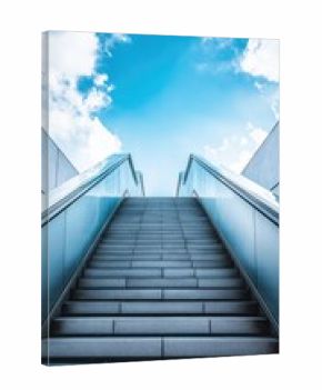 A staircase with a blue sky in the background