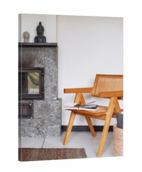 Cozy fireplace and modern chair create a warm atmosphere in the living room