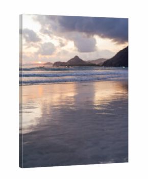 Reflection of Bukit Semeti hills, Selong Belanak Beach, Lombok