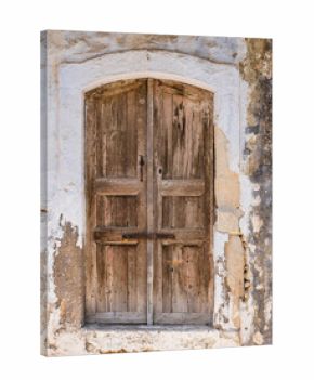 old entrance door seen from the outside of the building