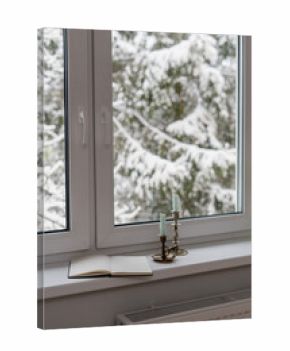 Comfortable indoor view of winter landscape through a window