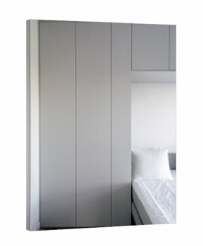 Modern hotel bedroom with minimalist design and comfortable bed for relaxation