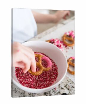 Homemade Gourmet: Delightful Pretzels Adorned with Pink Chocolate and Sprinkles