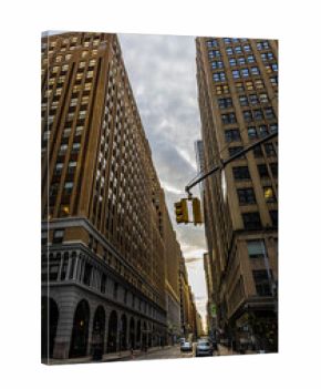 Lower Manhattan street intersection with historic office towers in New York City