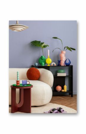 Stylish interior of colorful living room with design white sofa, black shelf with vases, book and personal accessories. Modern home decor. Template.