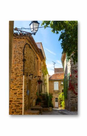 Historic old alley in the Provencal village Grimaud, Provence, France