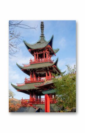 Copenhagen, Denmark - October 30, 2022: Exterior of the Japanese Pagoda inside Tivoli Gardens, an amusement park in the city center.