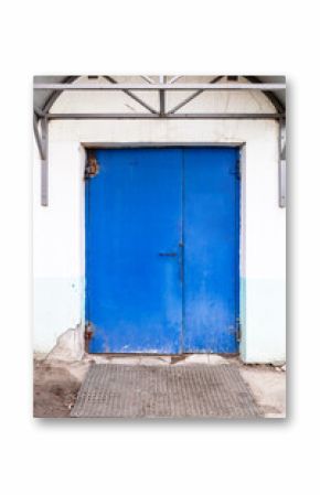 closed blue painted steel double door in building