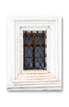 window with openwork lattice in old monastery wall
