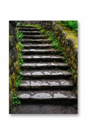 Flagstone rock stairs curving uphill around stone block retaining walls, Horsetail Falls in the Columbia River Gorge, National Scenic Area, spring adventure and tourism in Central Oregon 