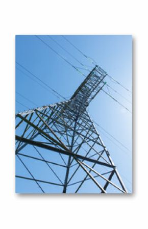 A tall power tower with wires and a blue sky in the background
