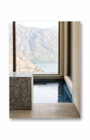 Tranquil indoor pool with stunning lake view in a modern architecture setting