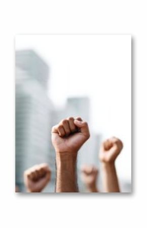 Protesters are raising their fists in a powerful display of solidarity against immigration raids and policies in the united states, symbolizing resistance and demanding change