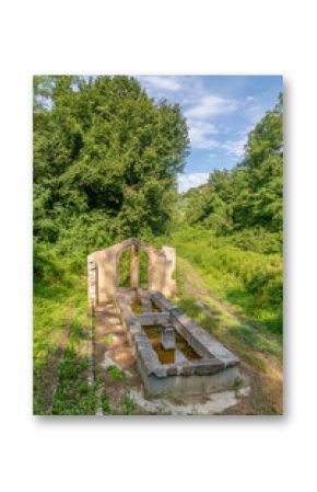 The 19th century Castagni fountain, old wash houses where housewives washed baskets of clothes, Fauglia, Pisa, Italy