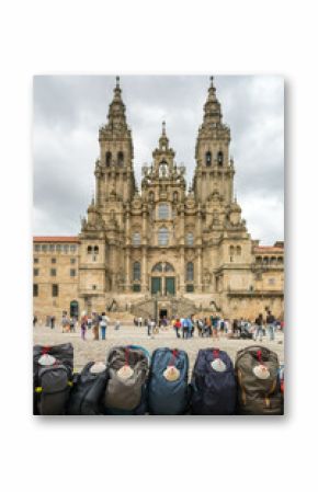 Backpacks with traditional Pilgrims shells at the foot of the Cathedral of Santiago de Compostela, Glicia, Spain