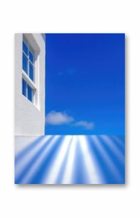 White Building Exterior With Blue Sky and Sun Rays