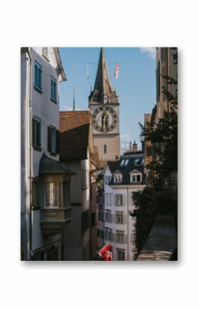 St. Peter church tower rising above zurich's niederdorf district
