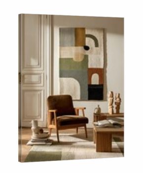 Elegant living room featuring a cozy chair, abstract wall art, and minimalist decor in a sunlit space