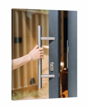 Modern front door with transparent glass and stainless steel handle