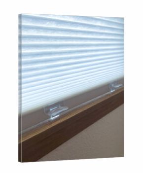 Close-up of closed white cellular blinds
