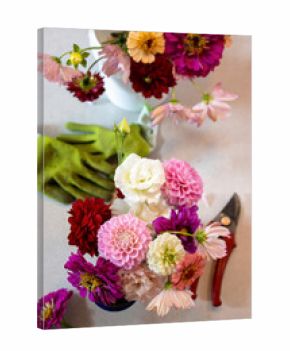 Overhead view of garden bouquet with gloves and clippers