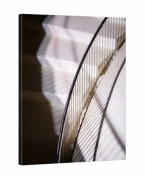 Contrast of Light and Shadow on Curved Staircase