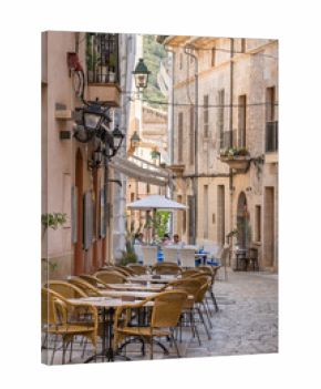 Sidewalk restaurant scene in Pollensa, Mallorca, Spain, summer