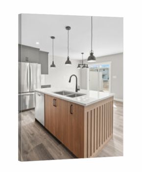 Kitchen with a wooden island and stainless steel appliances