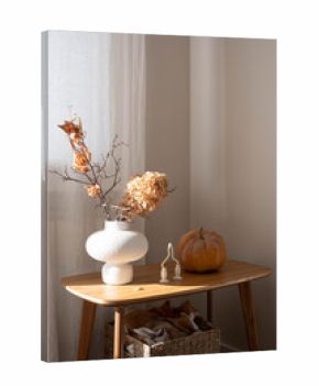 autumn decor arrangement, ceramic vase with autumne leaves and branches, pumpkin setup with seasonal accents on wooden bench, cozy autumnthemed minimalist home. High quality photo