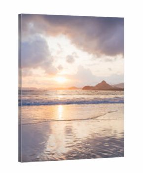 Golden sunset reflection on wet sand, Selong Belanak Beach, Lombok