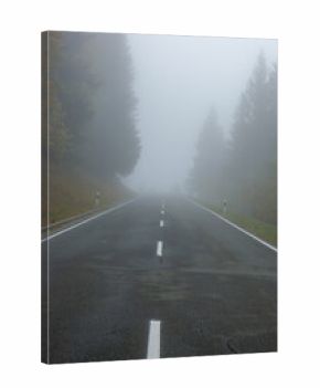 foggy, wet and slippery mountain road