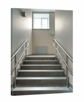 A staircase with a window above it